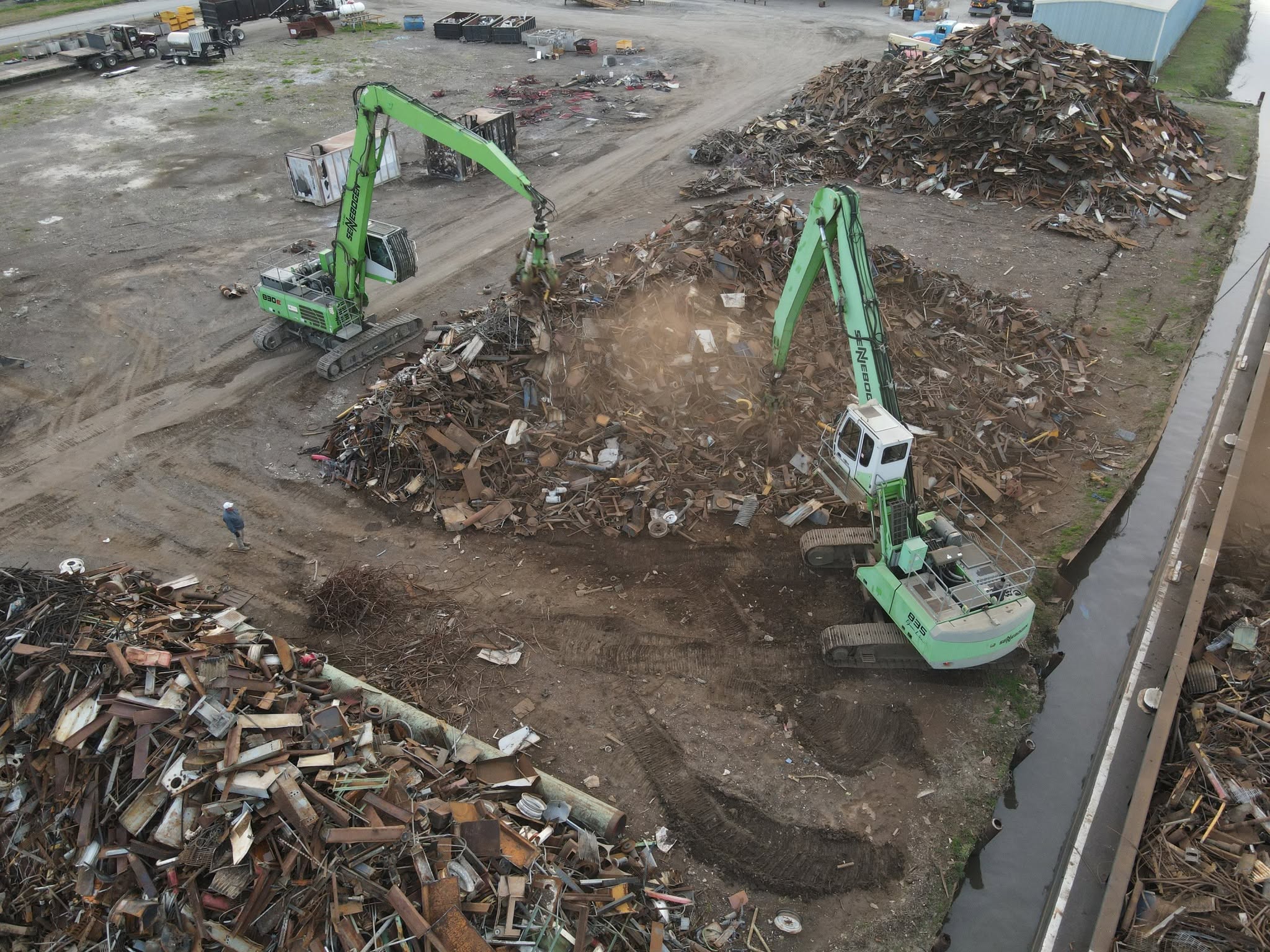 Heavy equipment working in the Thibodeaux & Son scrap yard