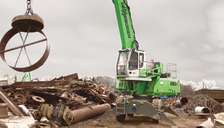 Material handler moving scrap